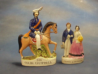 A reproduction Staffordshire figure "Sir Colin Campbell" 11" and 1 other Prince and Princess 8"