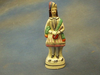 A Staffordshire figure of a Scotts Girl 8"