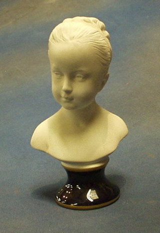 A biscuit porcelain head and shoulders portrait bust of a girl 8"