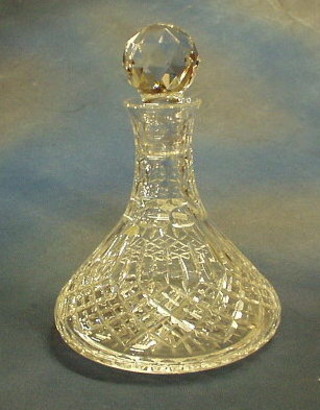 A cut glass ships decanter