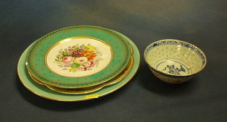 An Oriental tea bowl and a collection of plates