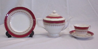 A 21 piece Royal Worcester Regency pattern tea service comprising teapot, cream jug and sugar bowl, 6 plates, 6 cups and 6 saucers and a Villeroy & Boch dish cake stand