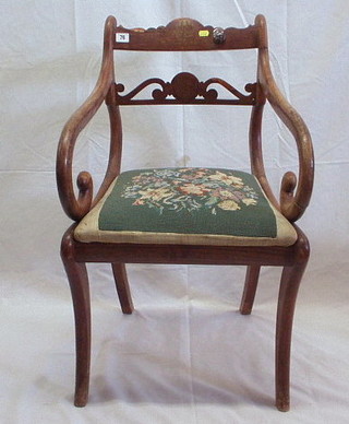 A Regency rosewood and inlaid brass carver chair