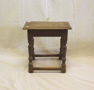 A 19th Century oak joyned stool, on turned and block supports 18"