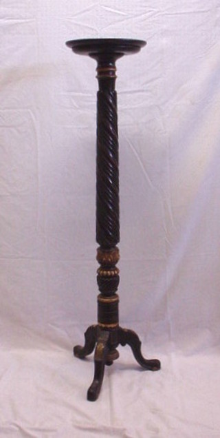 A 19th Century carved ebonised and gilt painted torchere