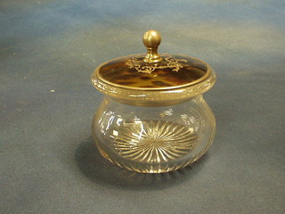 A circular cut glass powder bowl with silver and tortoiseshell lid, London 1929