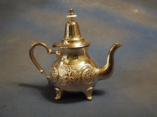 An Eastern silver plated teapot