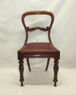 A set of 6 Victorian mahogany spoon back dining chairs with shaped mid rails and upholstered drop in seats, raised on chamfered turned supports