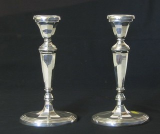 A pair of modern Adam style silver plated candlesticks 11"