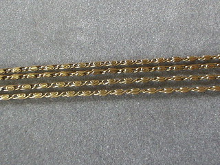 A gilt metal guard chain