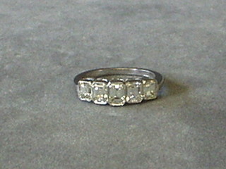 A lady's white gold engagement ring set 5 square cut diamonds (approx 1.62ct)