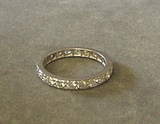 A lady's 18ct white gold full eternity diamond set ring