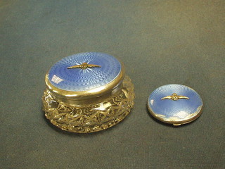 A circular cut glass dressing table jar with silver and enamelled lid decorated RAF wings and a matching compact (enamel f), Birmingham 1932 by Gives of Old Bond St.
