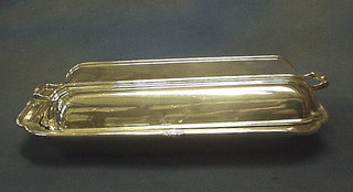 An Art Deco silver plated twin handled entree dish and cover