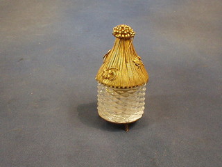 An Evans 1950's cut glass and gilt metal cigarette lighter in the form of a haystack decorated insects, 5"