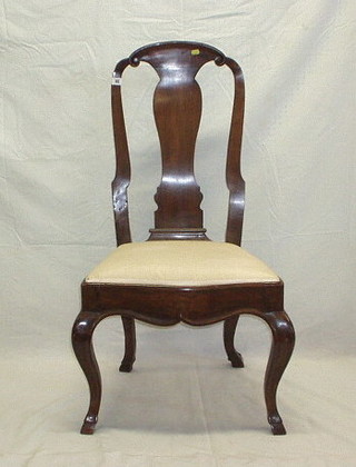 A Queen Anne style Continental mahogany splat back dining chair, with upholstered drop in seat, on cabriole supports