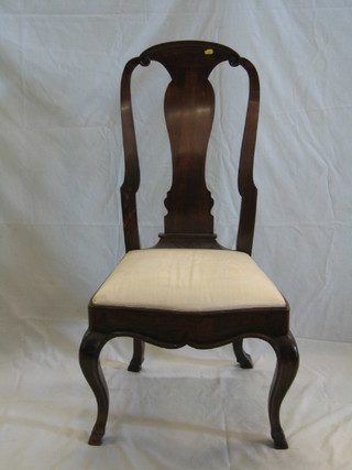 A Continental Queen Anne style walnutwood splat back dining chair with upholstered drop in seat, on cabriole supports