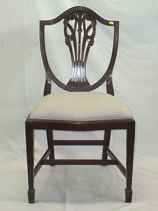 A set of 6 Continental mahogany Hepplewhite style shield back dining chairs with upholstered seats on square tapering supports united by H framed stretchers (f and r)