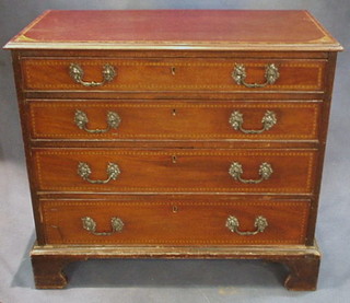 A Georgian inlaid and crossbanded mahogany "Channel Islands" chest of 4 long drawers with brass swan neck drop handles, raised on bracket feet 34"