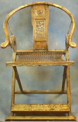 A pair of 19th/20th Oriental hardwood folding chairs