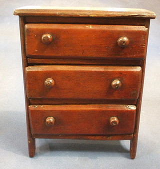 A pine apprentice chest of 3 long drawers 8"