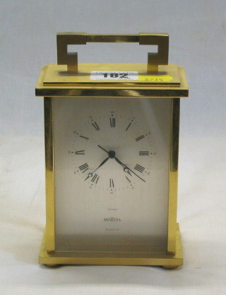 An Angelus battery operated carriage clock