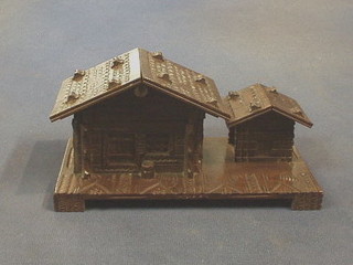 A Swiss carved wooden inkwell and stamp tray in the form of 2 Swiss cottages 7"