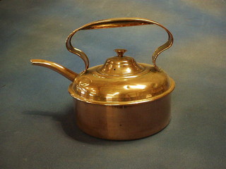 A circular copper kettle