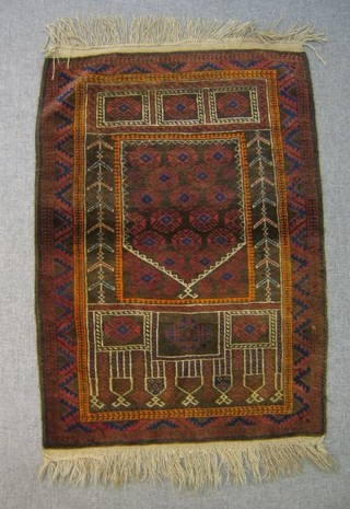 A contemporary brown and red ground prayer rug with multi-row borders 73" x 35"