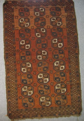 A Bokhara carpet with 27 octagons to the centre 64" x 41"