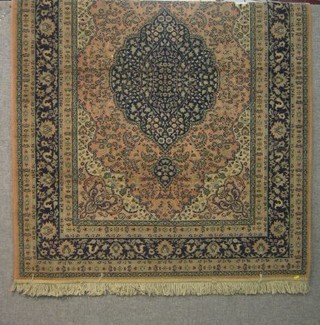 A contemporary pink ground and floral pattern Persian design Belgium carpet 66" x 50"