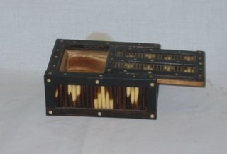 A rectangular porcupine quill box with sliding lid, 5"