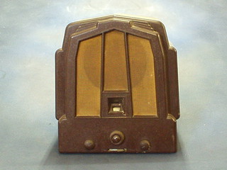 An Ecko Type M23 radio contained in a brown Bakelite case