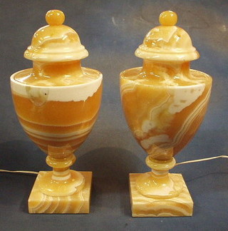 A pair of marble table lamps in the form of urns and covers 18"