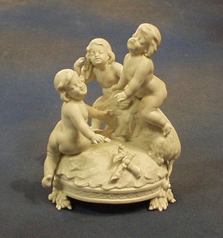 A Continental Parian figure of a wild Boar and 3 cherubs, the base incised 1271, 7"