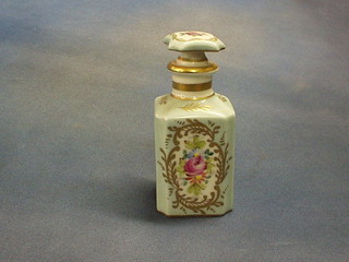 A square French porcelain scent bottle with gilt and floral decoration, the base marked Porcelaine de France