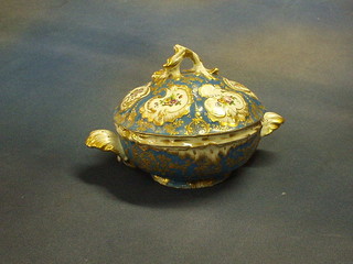 A  19th Century Sevres style porcelain circular jar and cover with floral panelled decoration, having scallop shaped gilt handles, the base marked MA, 7"