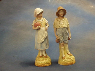 A pair of biscuit porcelain figures "Boy and Girl" 12"