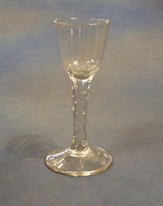 A 19th Century liqueur glass with faceted stem