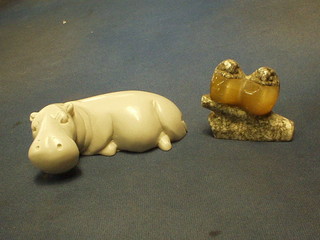 A stone figure of a reclining Hippopotamus 4" and 2, 2 colour stone figures of birds