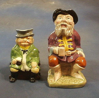 A pottery Toby jug of The Coachman and 1 other The Soothsayer (2)