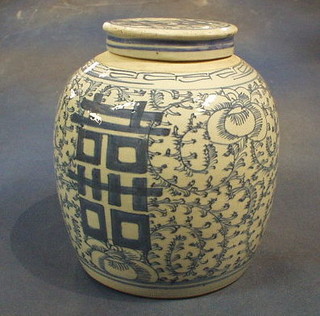 A 19th Century Oriental blue and white pottery ginger jar and lid, decorated characters 10"