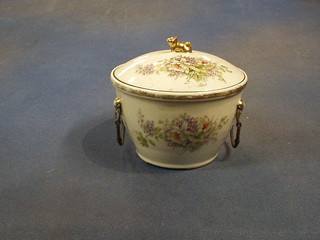 A 19th Century Oriental twin handled porcelain bowl with floral decoration, the inner section with insulated liner, the lid decorated a Dog of Fo, 4" 