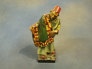 A Royal Doulton figure "The Carpet Seller" HN1464