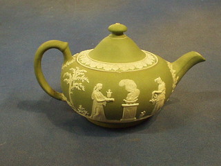 A Wedgwood green Jasperware teapot, the base marked Wedgwood and incised S