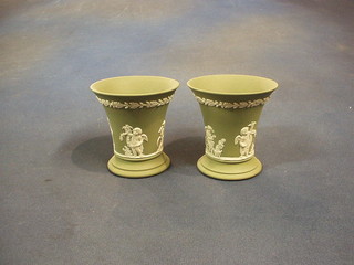 A pair of waisted Wedgwood green Jasperware vases, the bases marked 73, 3"