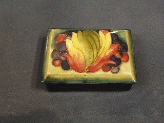 A Moorcroft leaf and grape pattern rectangular trinket box and cover, the base marked Made in England with Moorcroft signature and paper label Potter to HM The Queen, 5"