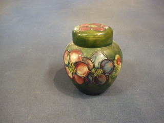 A  Moorcroft Clematis pattern ginger jar and cover, the base with paper label by Appointment W Moorcroft 4"