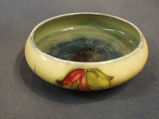 A Moorcroft circular Leaf in the Wind pattern bowl, the base with incised signature mark and impressed Pottery to HM The Queen, 6" (air bubble to glaze)