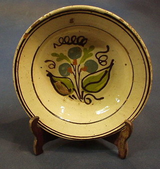 A  19th Century circular Continental Earthen ware bowl with painted floral decoration